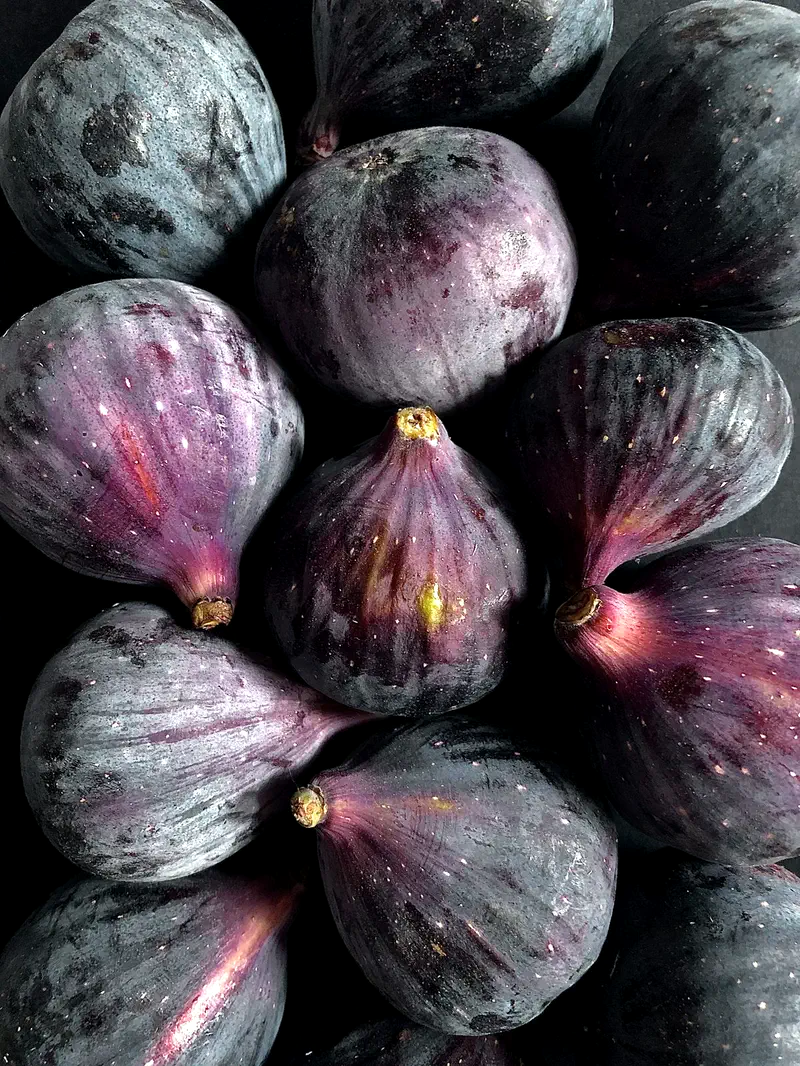 Close-up of ripe, dark purple figs